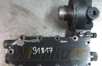Obudowa chłodniczki oleju z podstawą filtra Komatsu SAA6D114E-3 